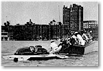 A broken oil line put Guy Lombardo's Tempo, Jr. out of the running in the Seven Litre Race. Driver Danny Foster accepts a tow.